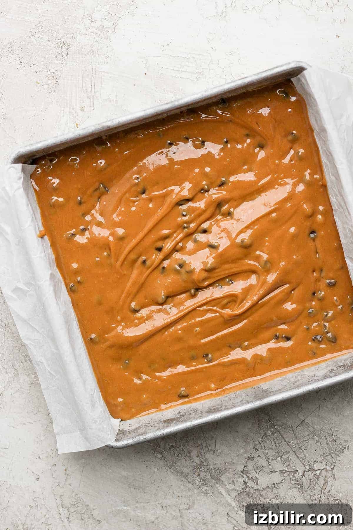 Fudge Ready for Freezing Cookie dough freezer fudge spread into a cake pan, ready to freeze