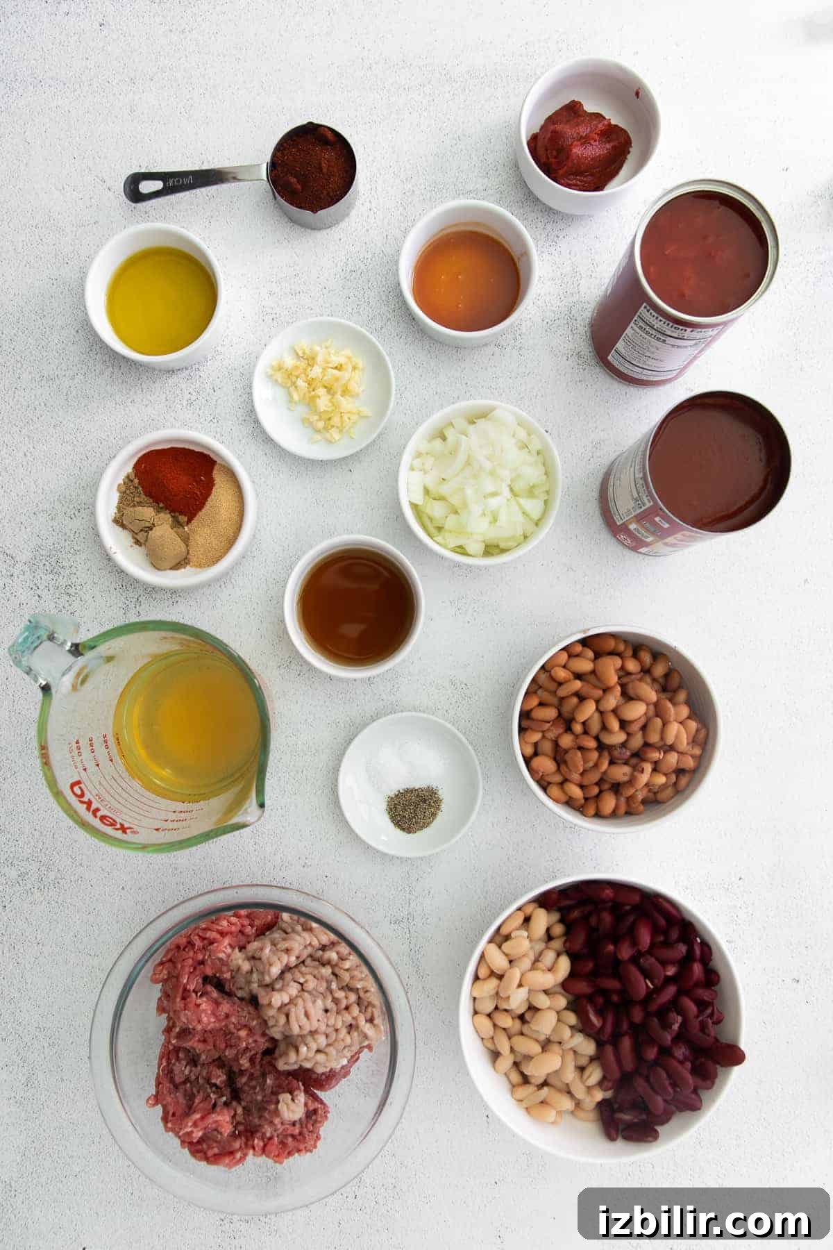 Hearty Instant Pot Beef and Bean Chili 4 instant pot chili ingredients in bowls ready to be mixed together.