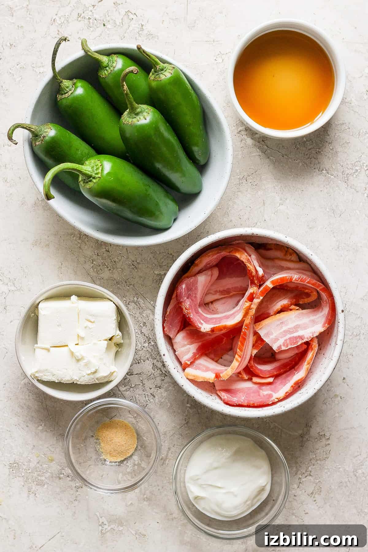 Ingredients for bacon and jalapeno poppers.