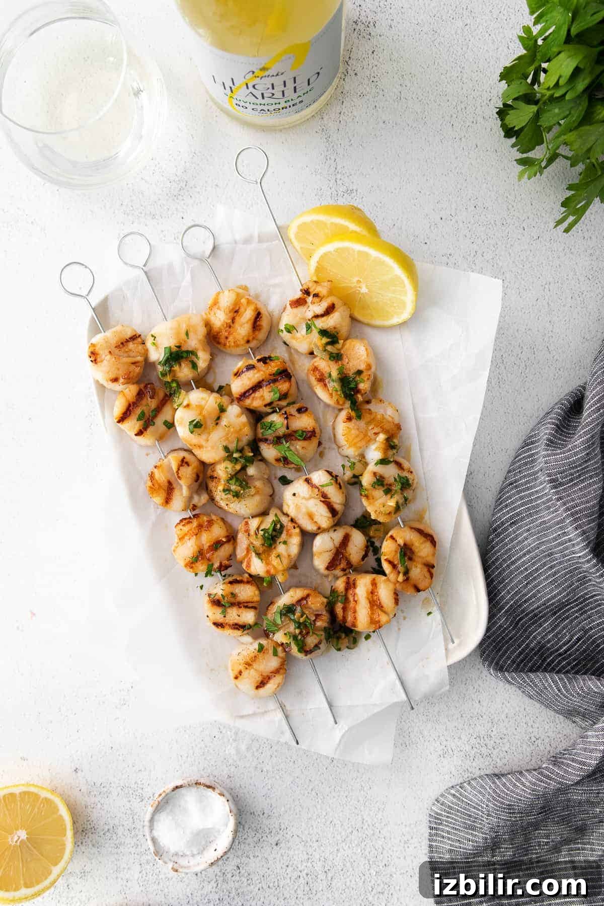 Grilled Scallops with Herbed White Wine Sauce 2 Grilled scallops on skewers