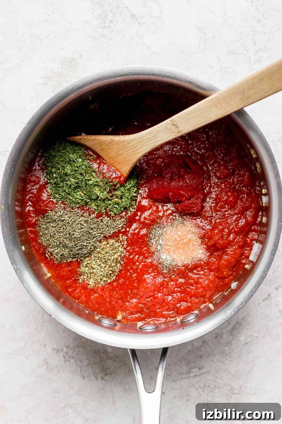 tomato sauce and spices in pot