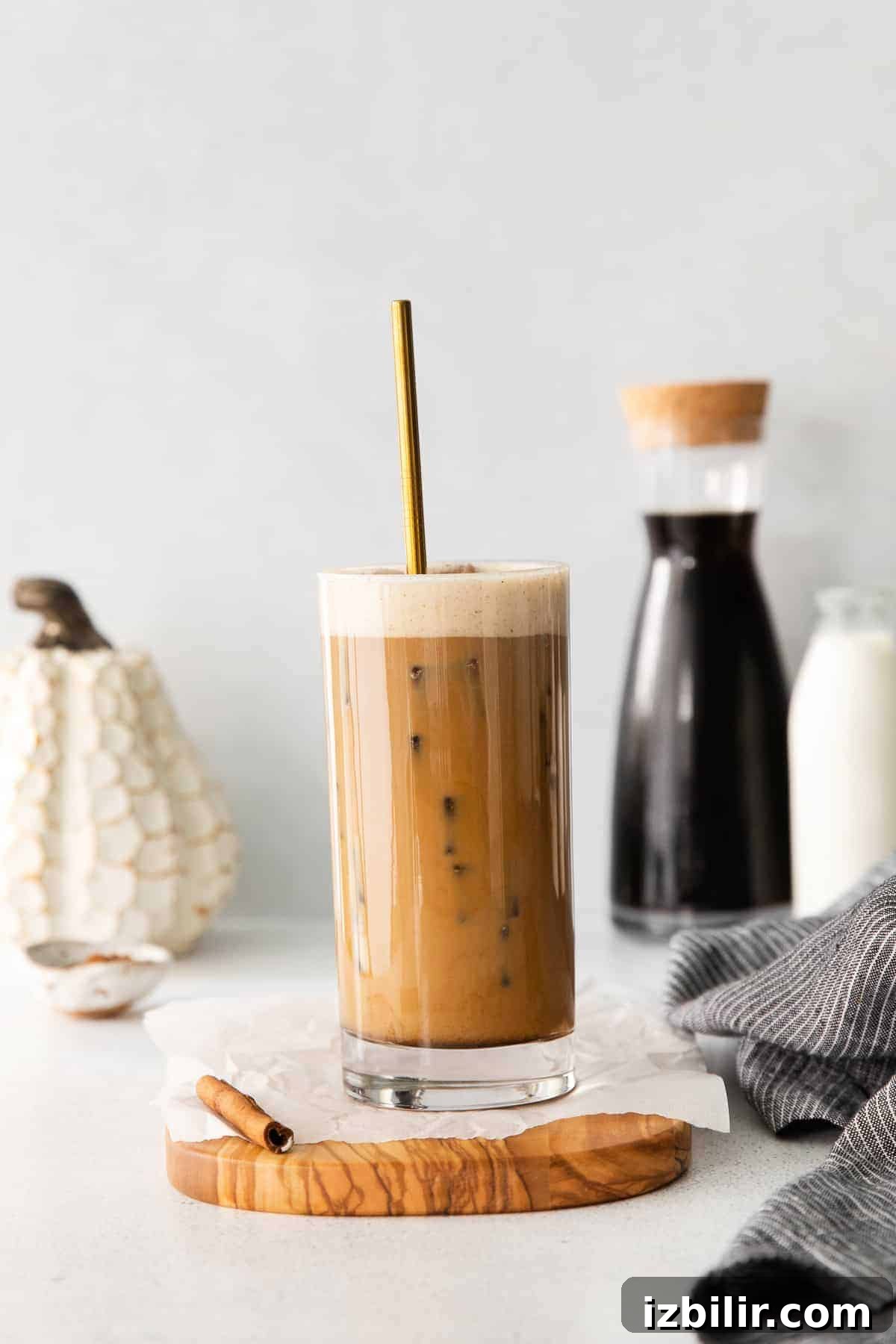 Pumpkin Cream Cold Brew mixed up in a tall glass.