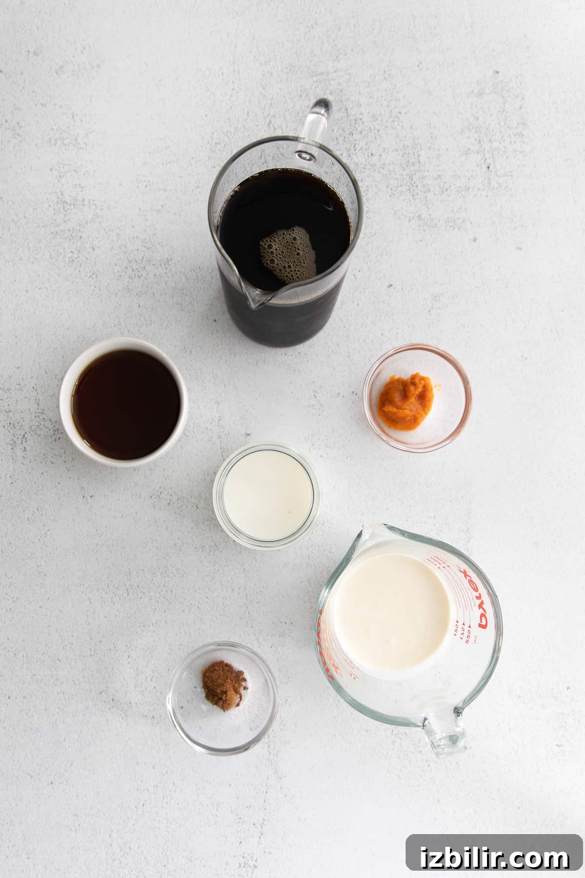 Pumpkin Cream Cold Brew ingredients in small containers.