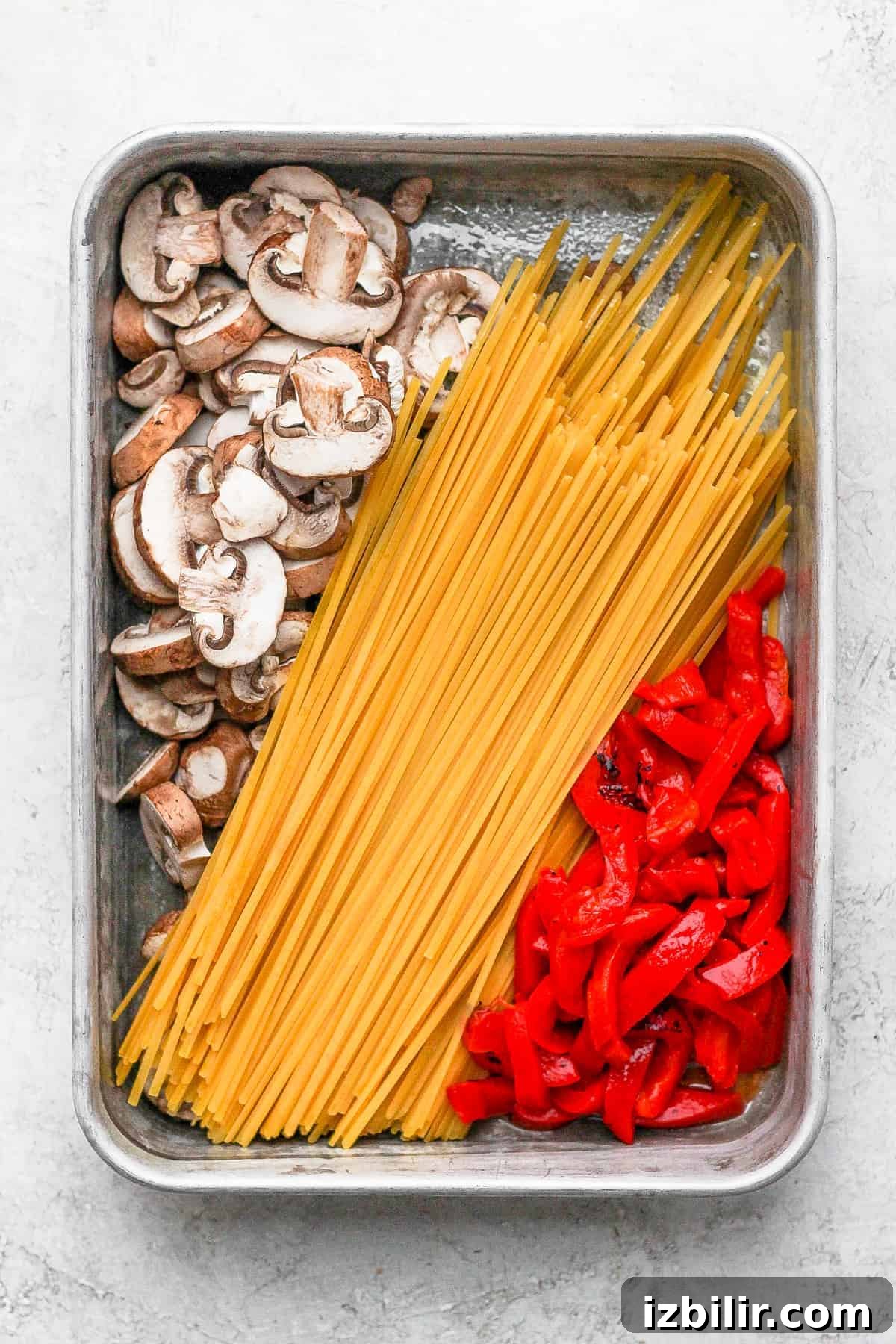 Creamy Baked One-Pot Pasta Recipe for Weeknights 4 All the ingredients for one pot pasta in a casserole dish.