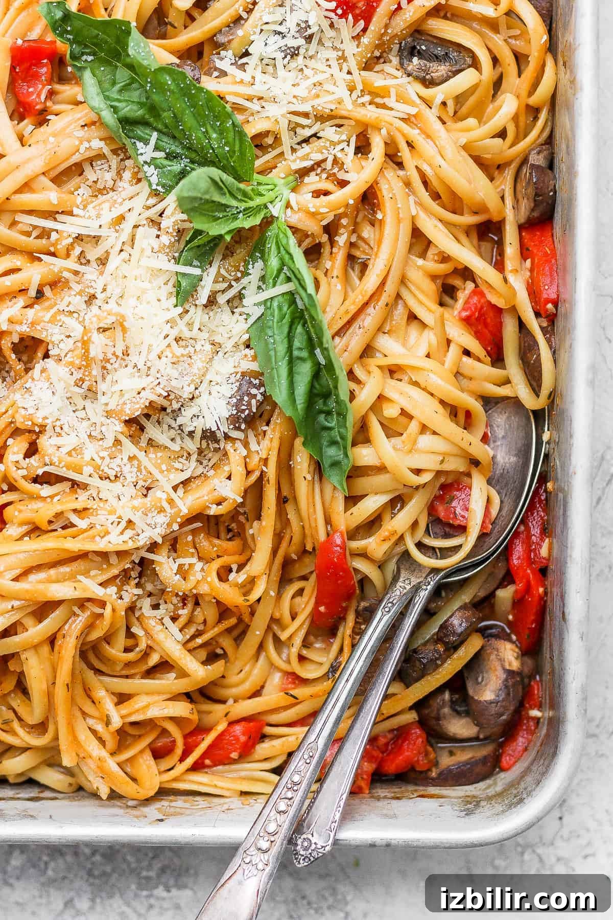 Creamy Baked One-Pot Pasta Recipe for Weeknights 7 Baked one pot pasta topped with parmesan and fresh basil.