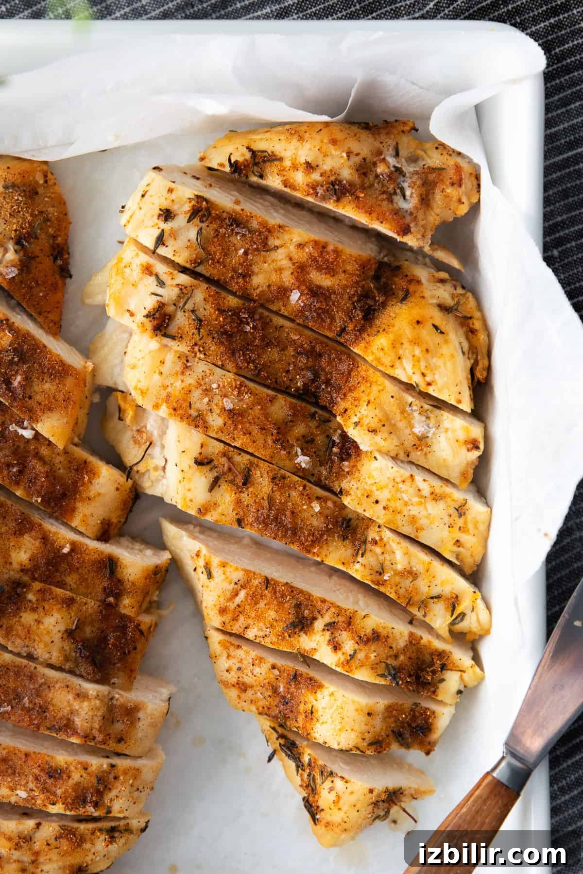 Juicy air fryer chicken breast chicken breast sliced in dish