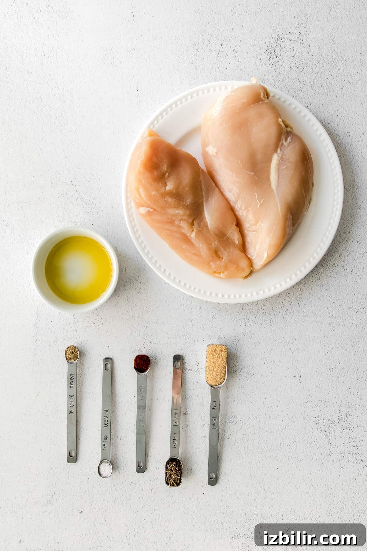 Ingredients for air fryer chicken breast ingredients on countertop