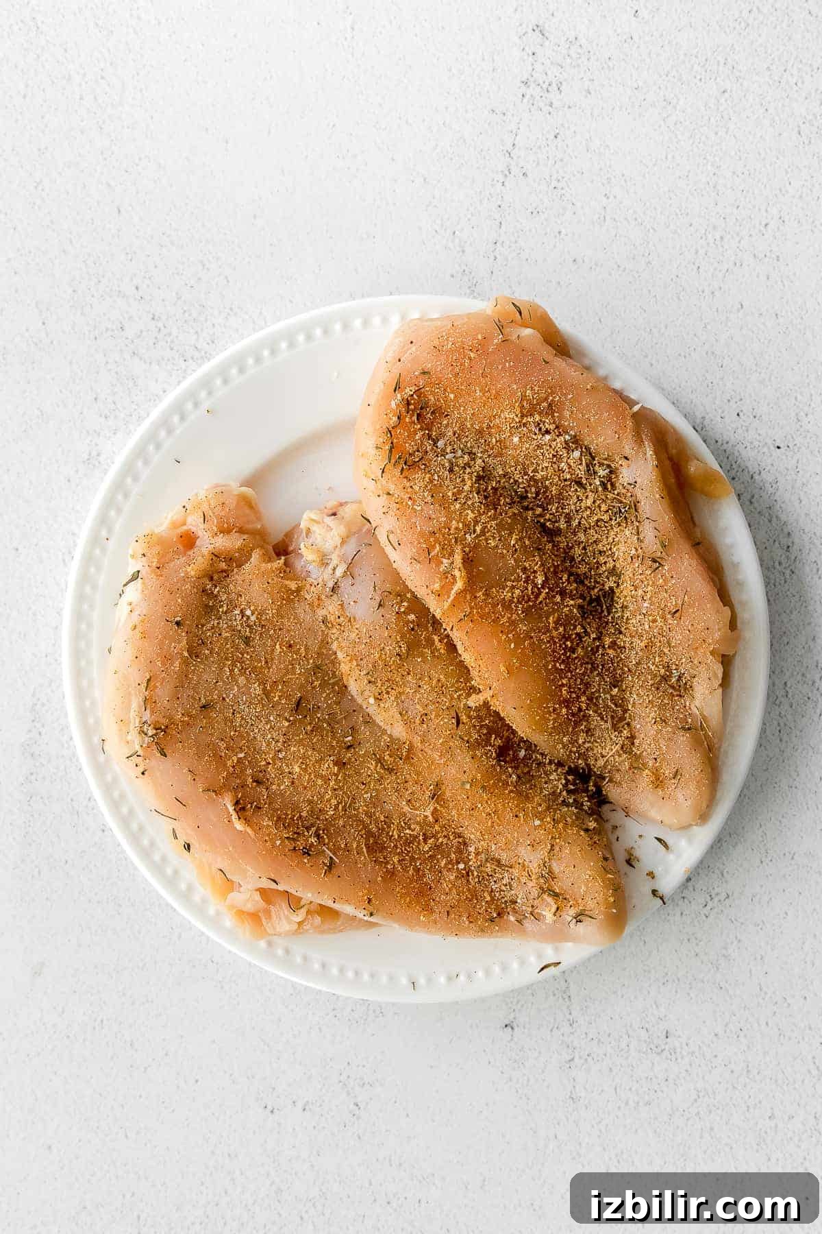 Seasoned air fryer chicken breast seasoned chicken breast on plate