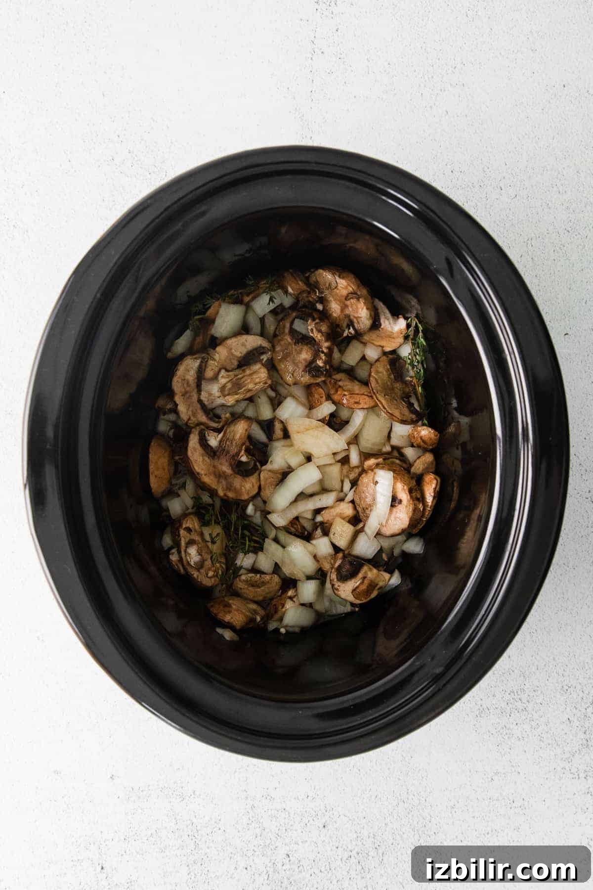 Vegetables cooking in the slow cooker veggies in a slow cooker for slow cooker beef stroganoff