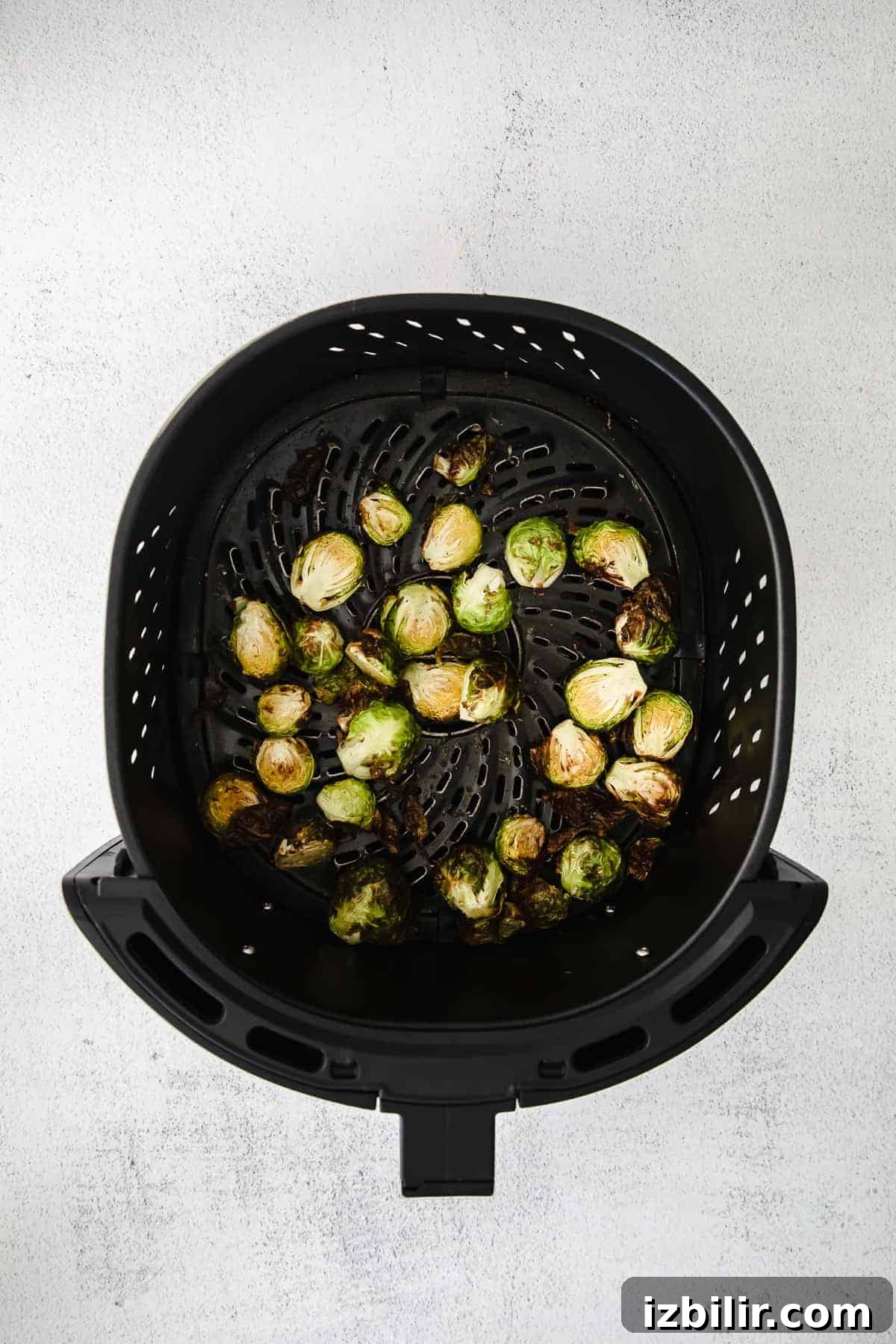 Crispy Air Fryer Brussels Sprouts Recipe 5 Brussel sprouts in an air fryer.
