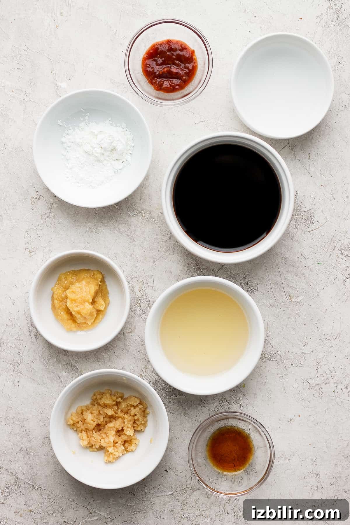 Ingredients ready to be mixed stir fry sauce ingredients in bowls ready to be mixed together