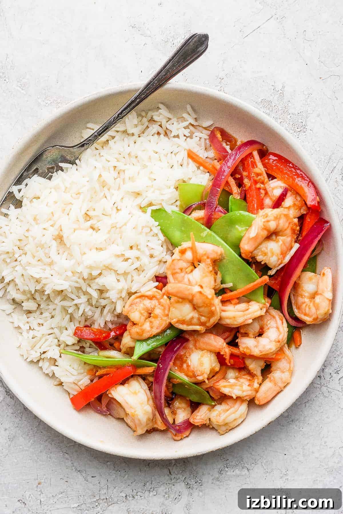 Protein- and veggie-packed shrimp stir fry shrimp stir fry in bowl