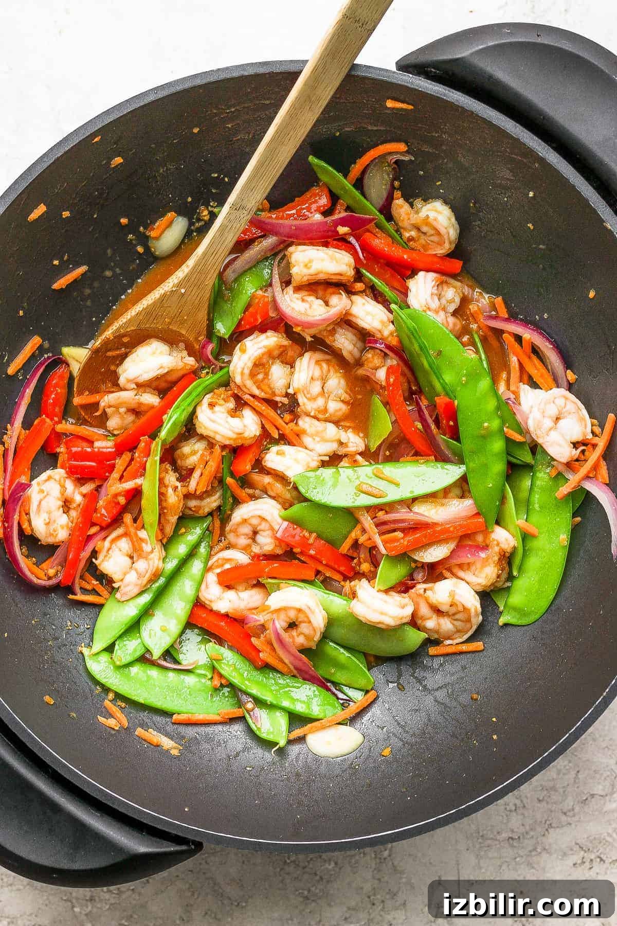 Shrimp stir fry cooking in a wok stir fry in wok