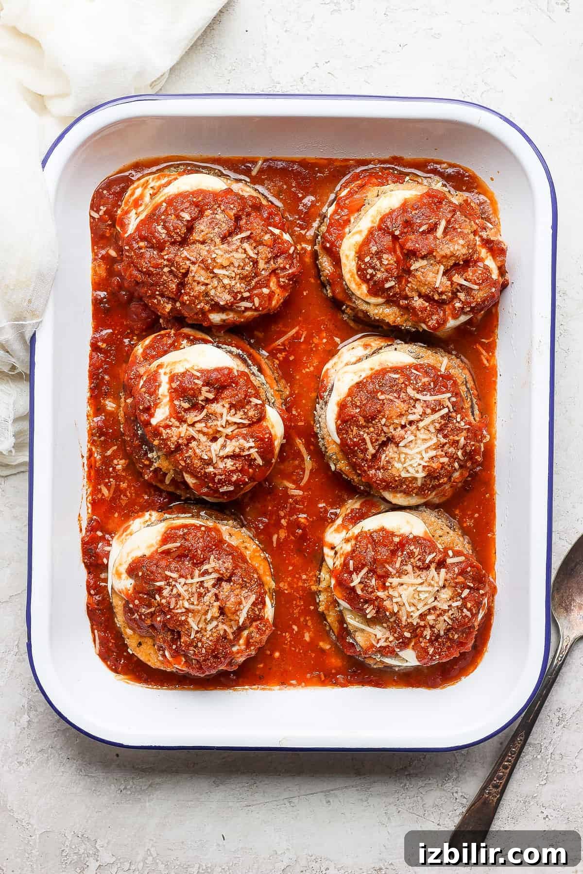 Crispy Baked Eggplant Parmesan Recipe 4 Eggplant parmesan in a baking dish.