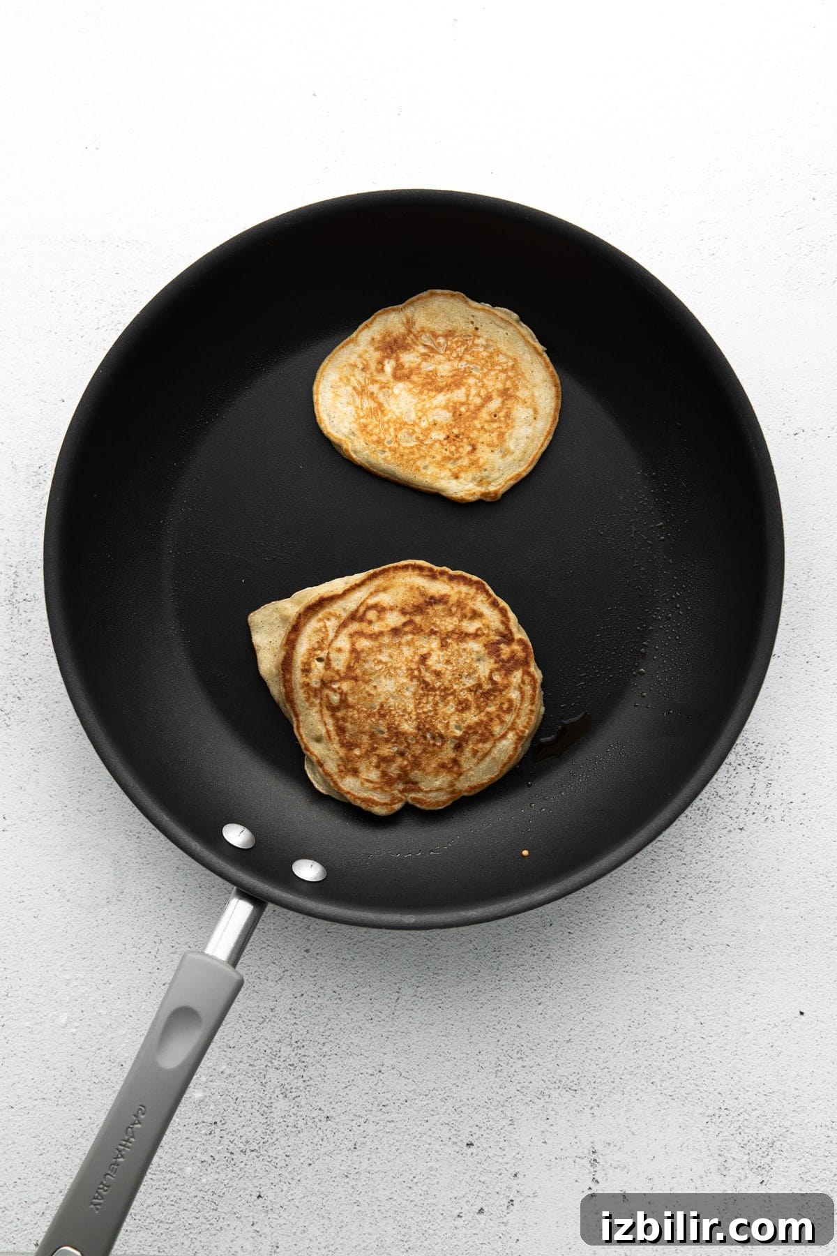 cooking pancakes in pan
