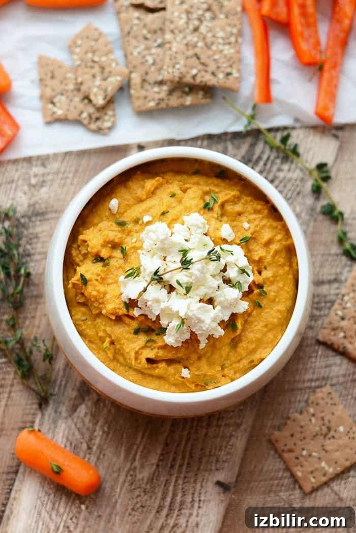 Creamy Roasted Sweet Potato Hummus Recipe with Garlic and Lemon 3 sweet potato hummus with goat cheese in white bowl