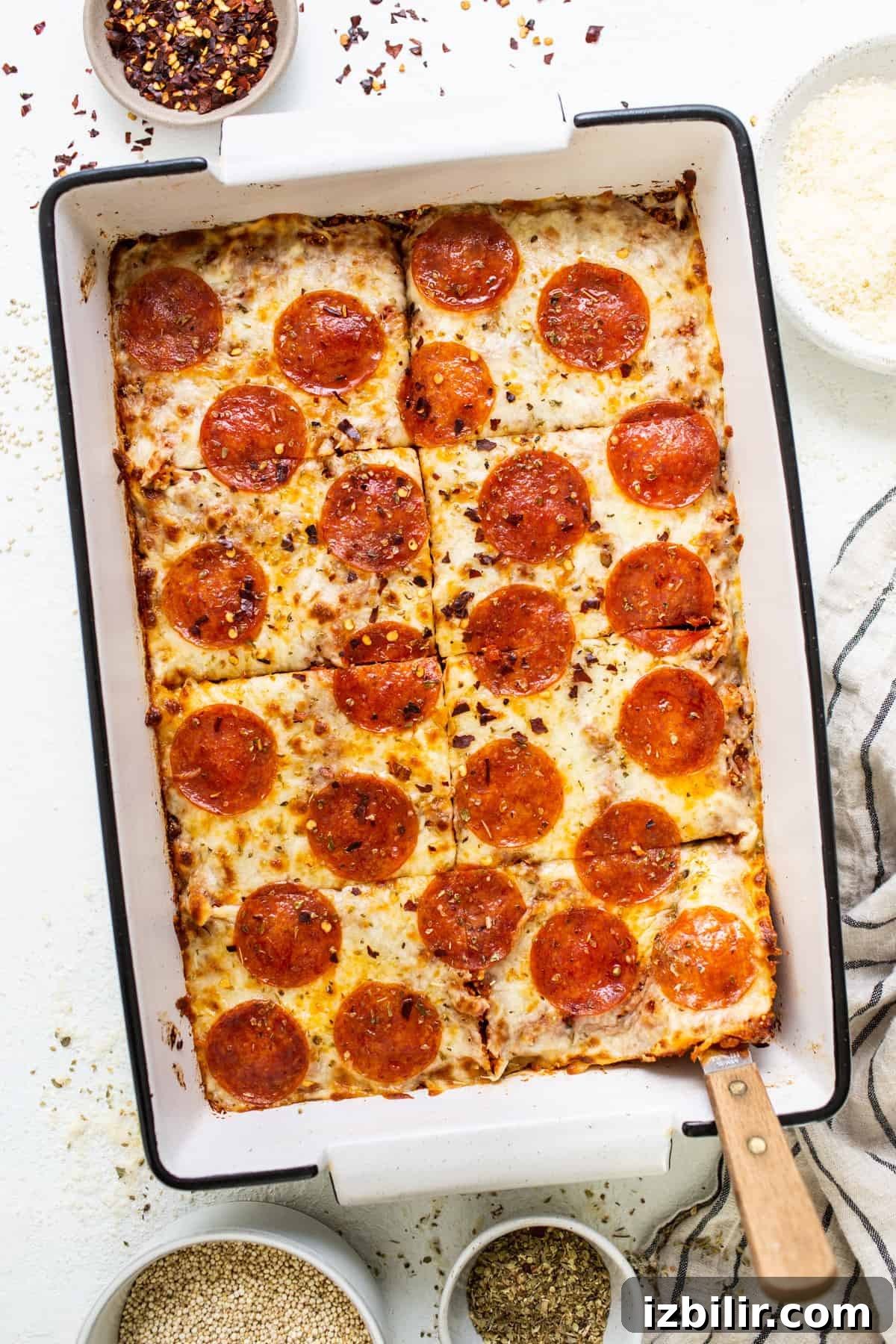 Pepperoni pizza in a baking dish.