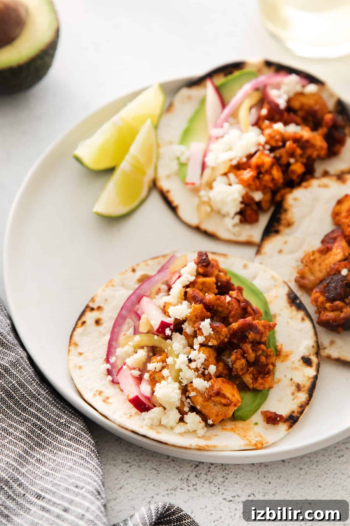 Tofu tacos with slaw and avocados.
