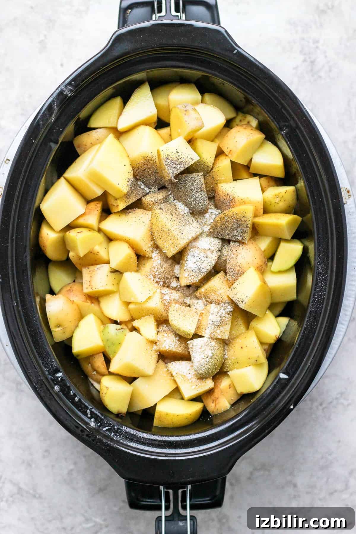 Chopped Yukon Gold potatoes in crock pot diced potatoes in crock pot