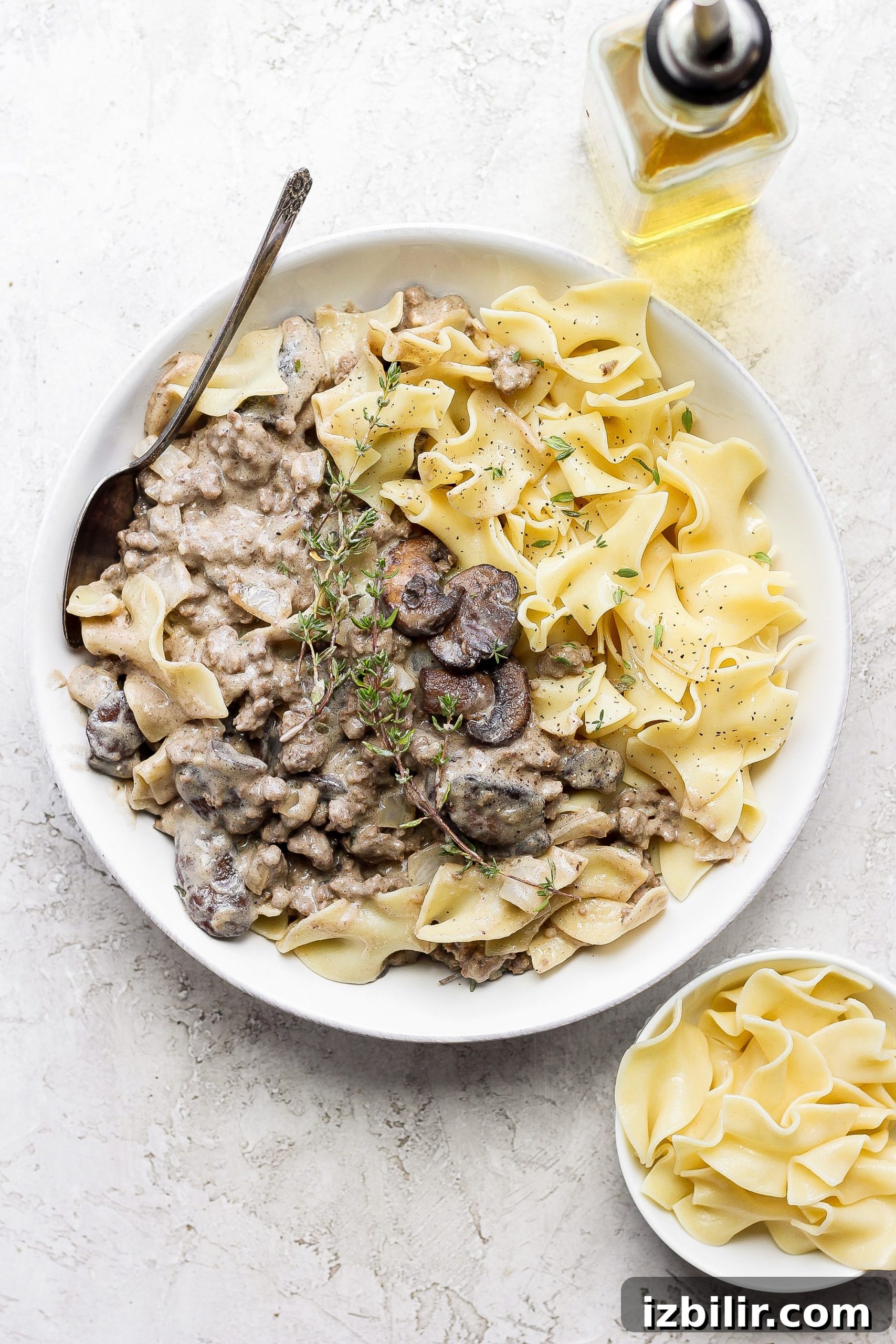 Ground beef stroganoff ground beef stroganoff in a bowl topped with fresh thyme