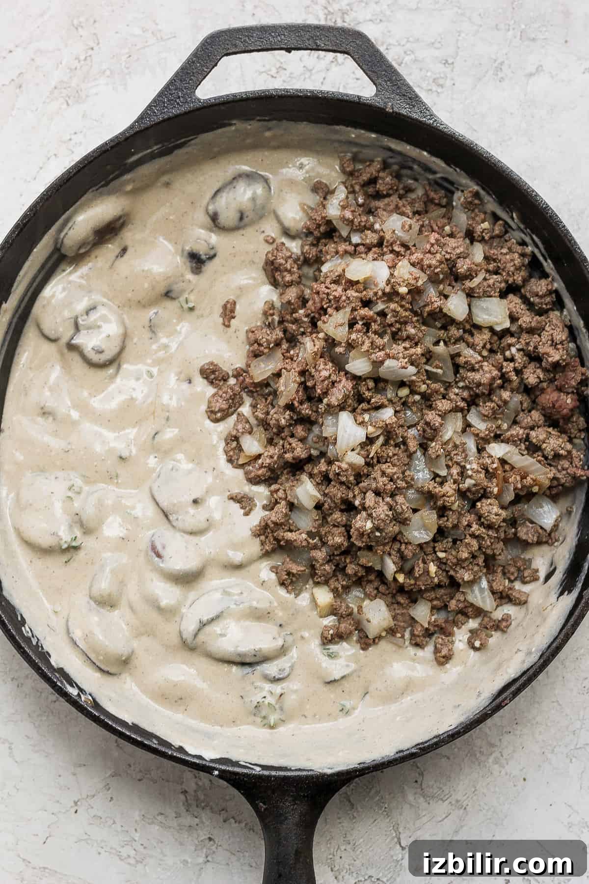 Making the stroganoff sauce ground beef stroganoff sauce in a cast iron skillet