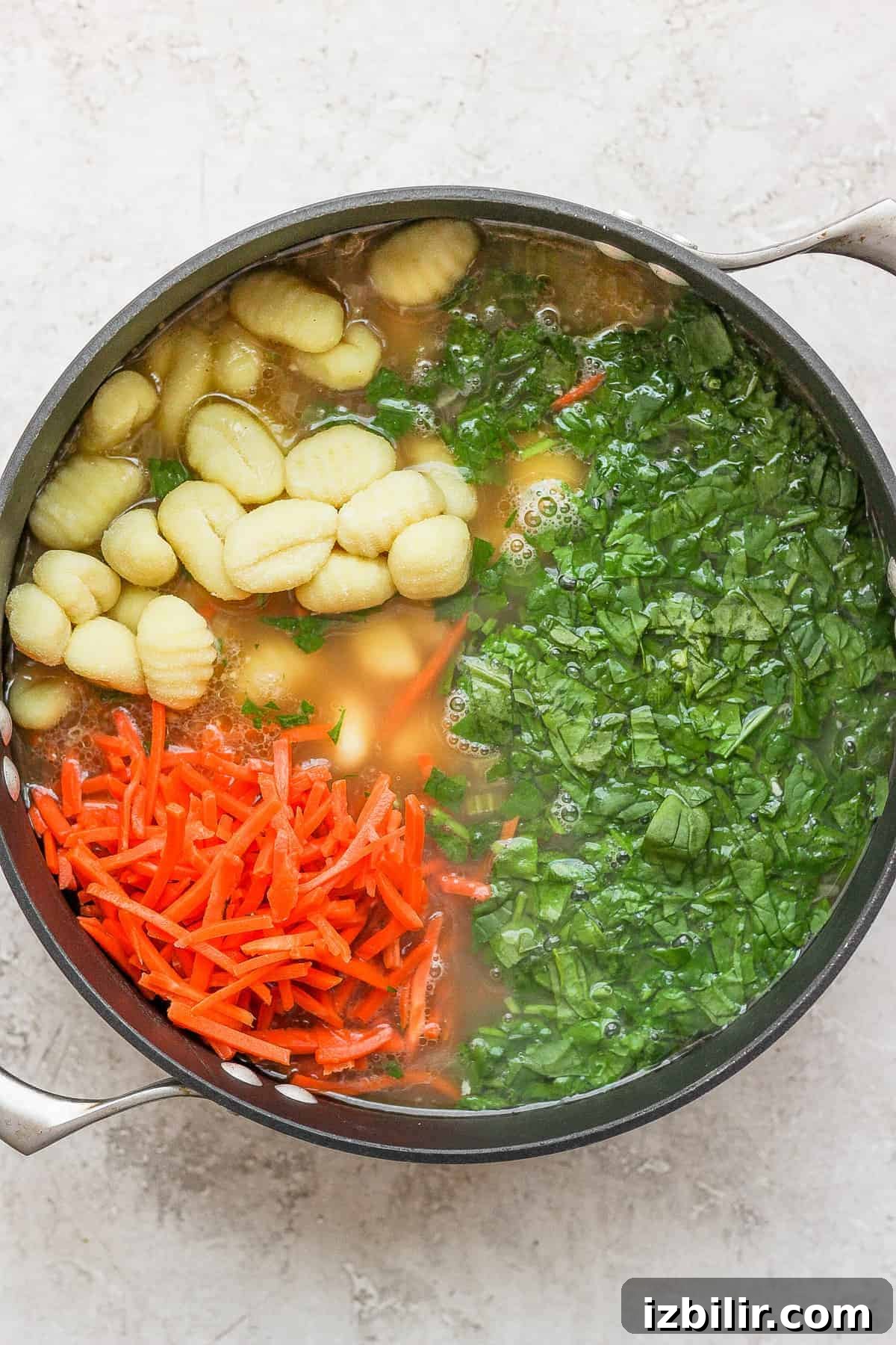 Ingredients in a stock pot Olive Garden chicken gnocchi soup ingredients in a stock pot