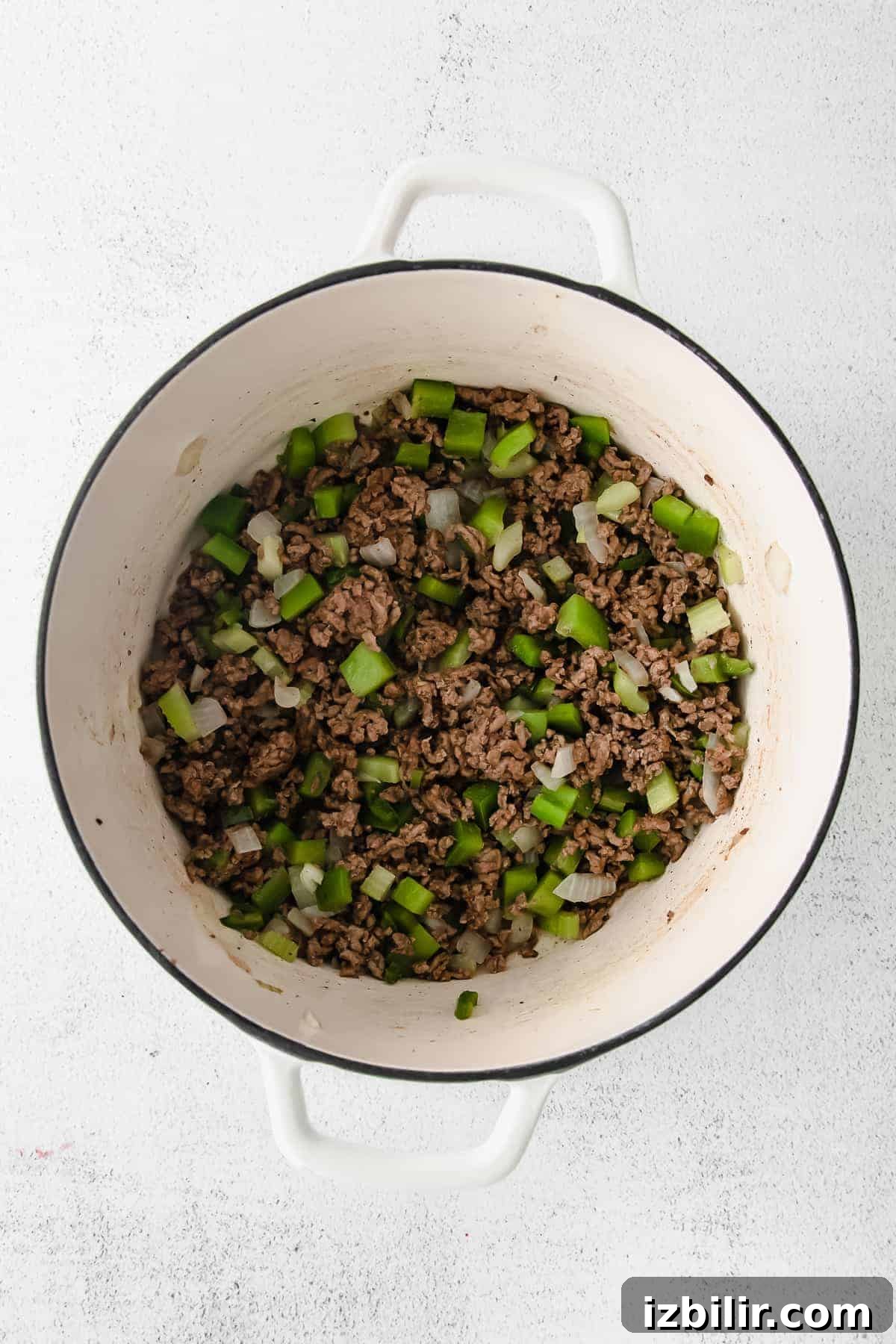Browning beef for chili Ground beef browning in a Dutch oven