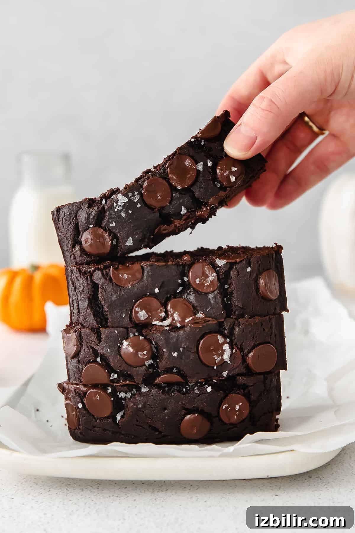 Pumpkin Chocolate Chip Bread 8 A stack of chocolate pumpkin bread.
