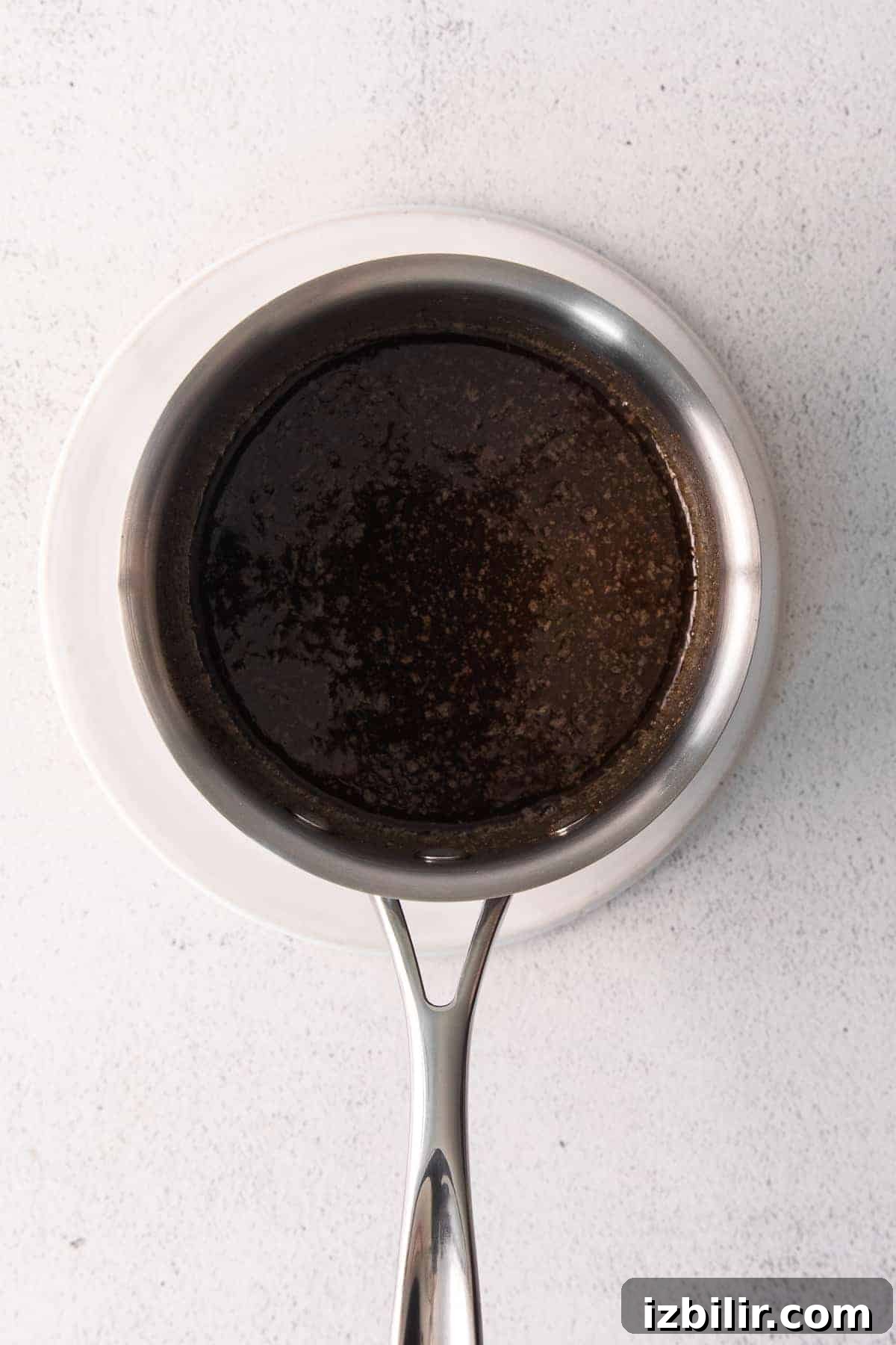 Chai chex mix syrup in a small saucepan.