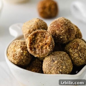 No-Bake Pecan Pie Energy Balls Recipe 8 Energy balls in a bowl.