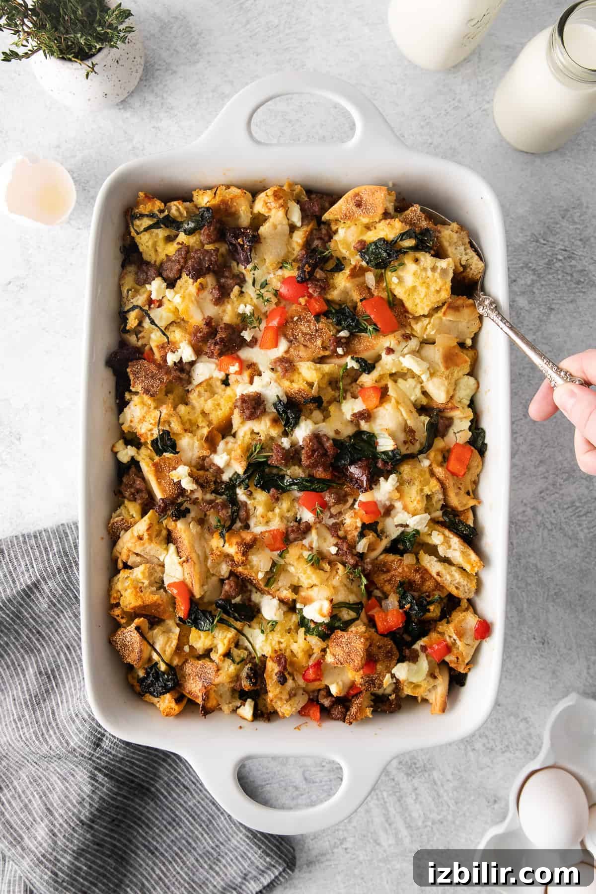 Make-Ahead English Muffin Breakfast Casserole 2 English muffin breakfast bake in a casserole dish.