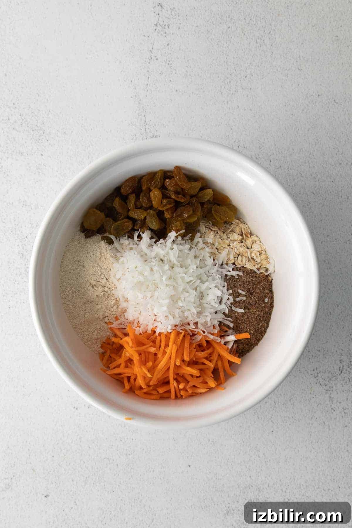 Dry ingredients for Morning Glory Baked Oatmeal dry ingredients for morning glory baked oatmeal in a bowl