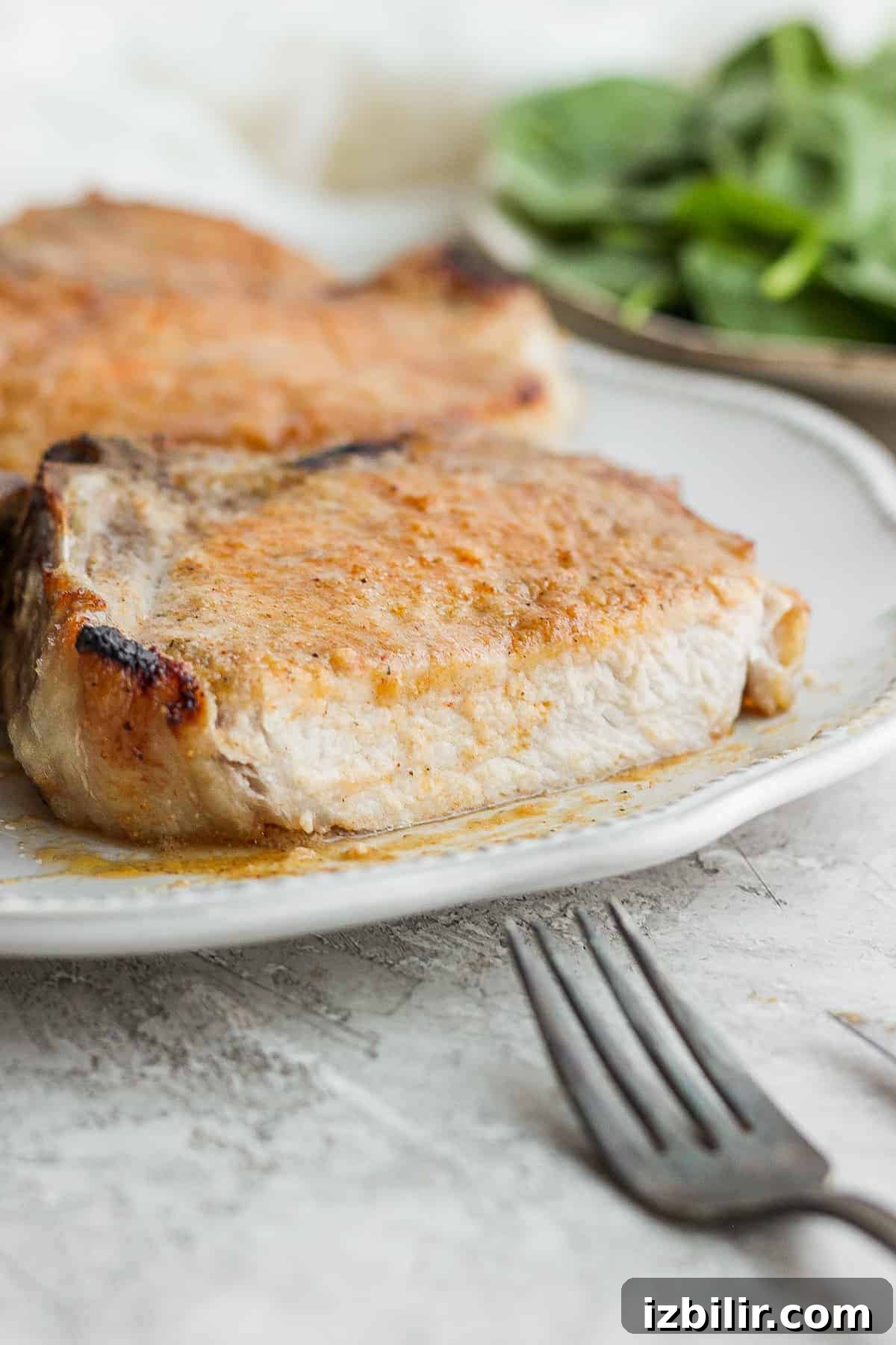 sliced pork chop on plate