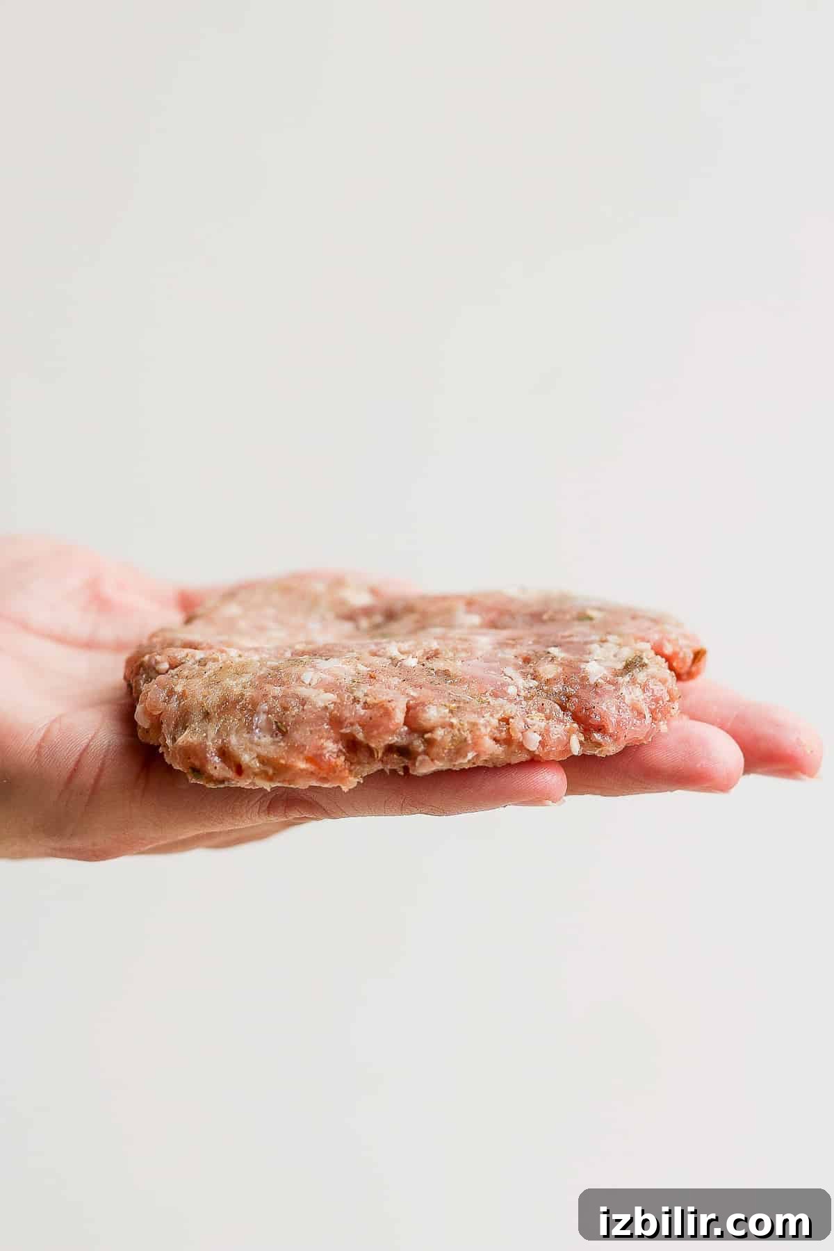 Forming the patties breakfast patty in palm of hand