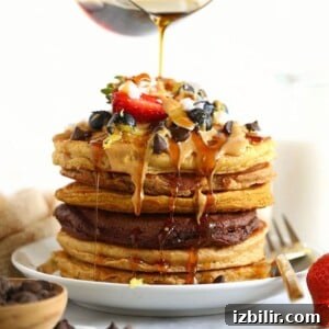 A stack of healthy pancakes with syrup