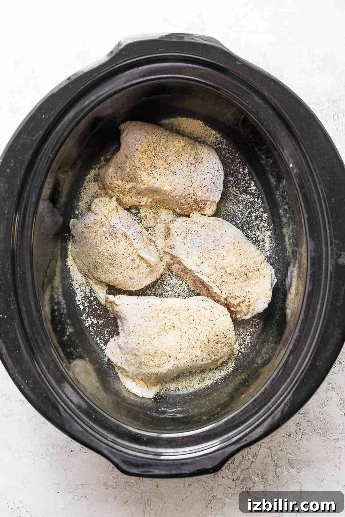 Homestyle Slow Cooker Chicken and Dumplings Recipe 4 chicken thigh in the slow cooker.