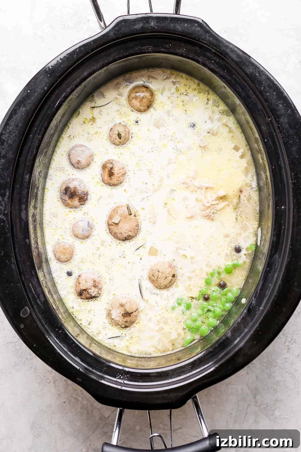 Homestyle Slow Cooker Chicken and Dumplings Recipe 6 Slow cooker chicken and dumplings in a slow cooker.
