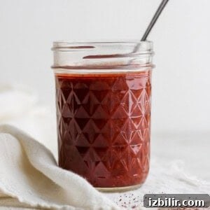 Light Enchilada Dip Recipe with Black Beans and Cheese 4 Enchilada sauce in a jar.