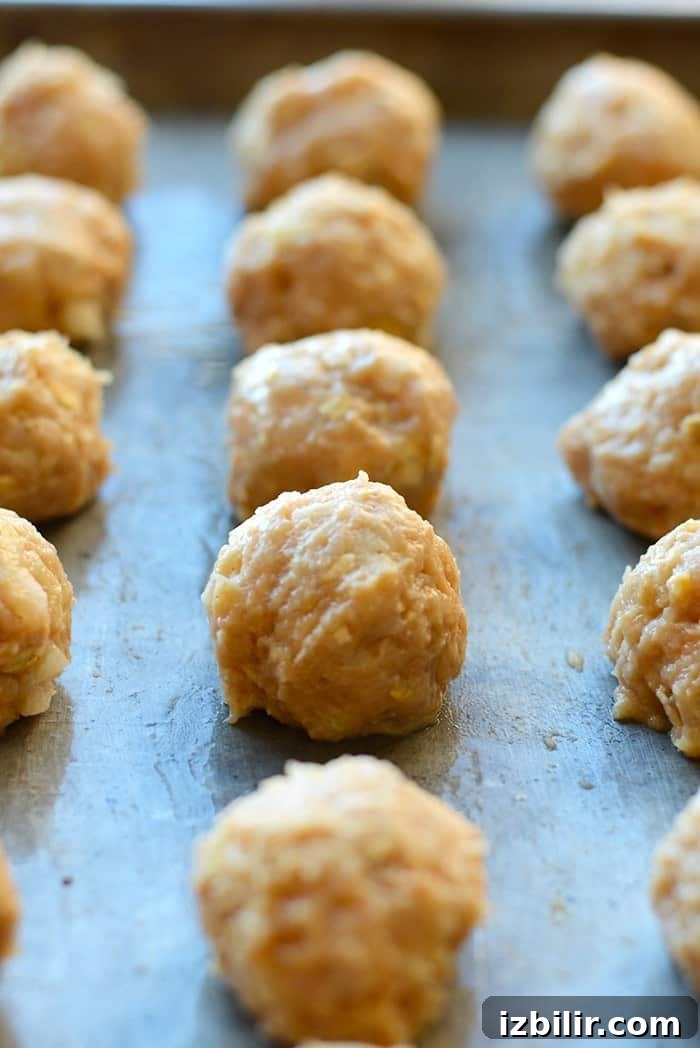 Baked Kung Pao Chicken Meatballs ready to bake Meatballs on pan