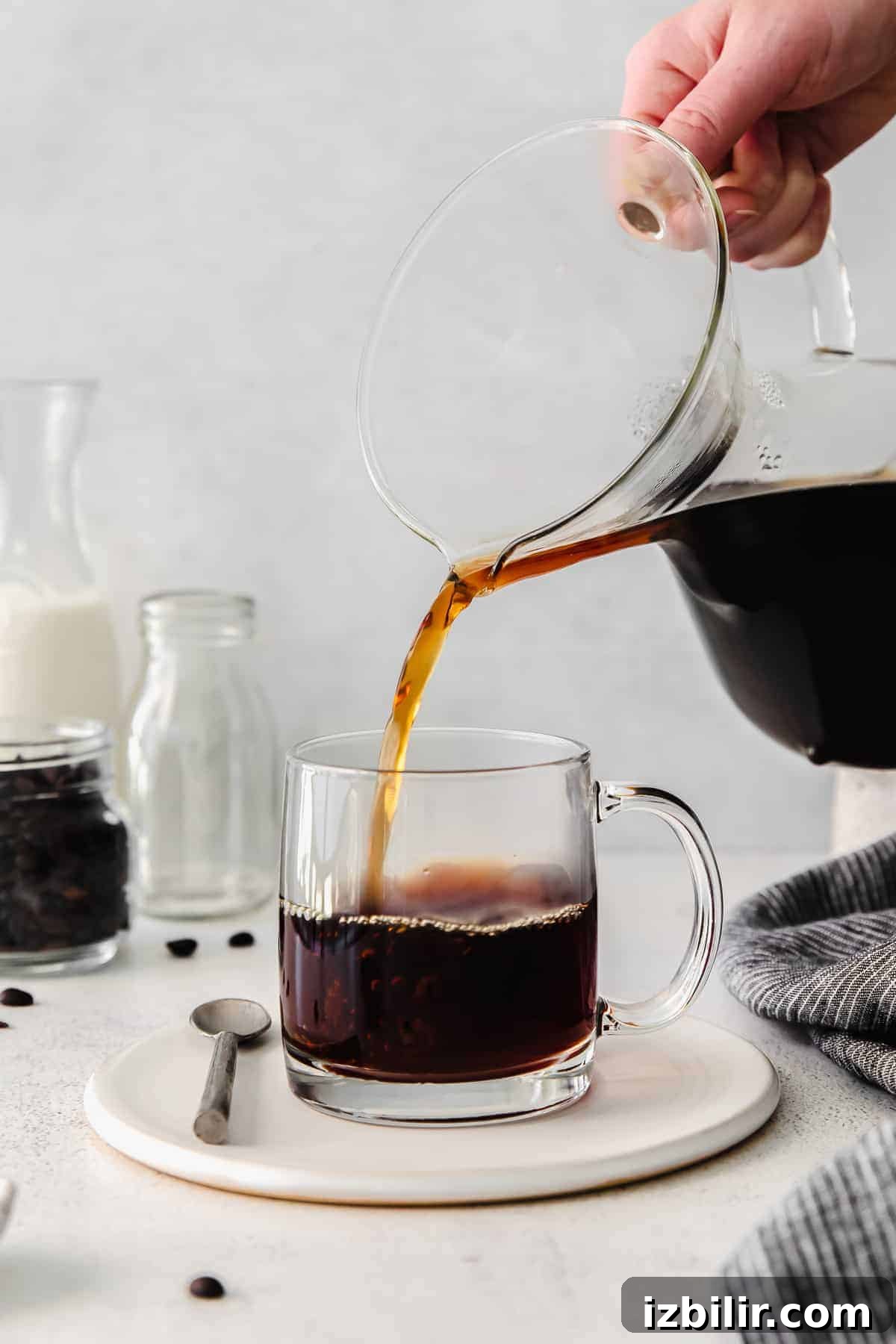 pouring coffee into mug