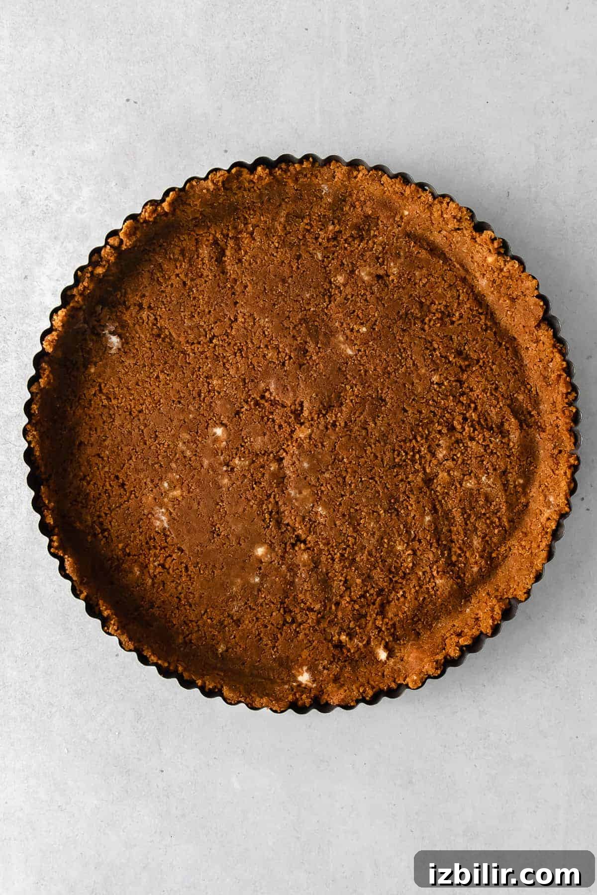 Classic French Apple Tart with Caramelized Apples 6 Baked gingersnap crust in a tart pan.