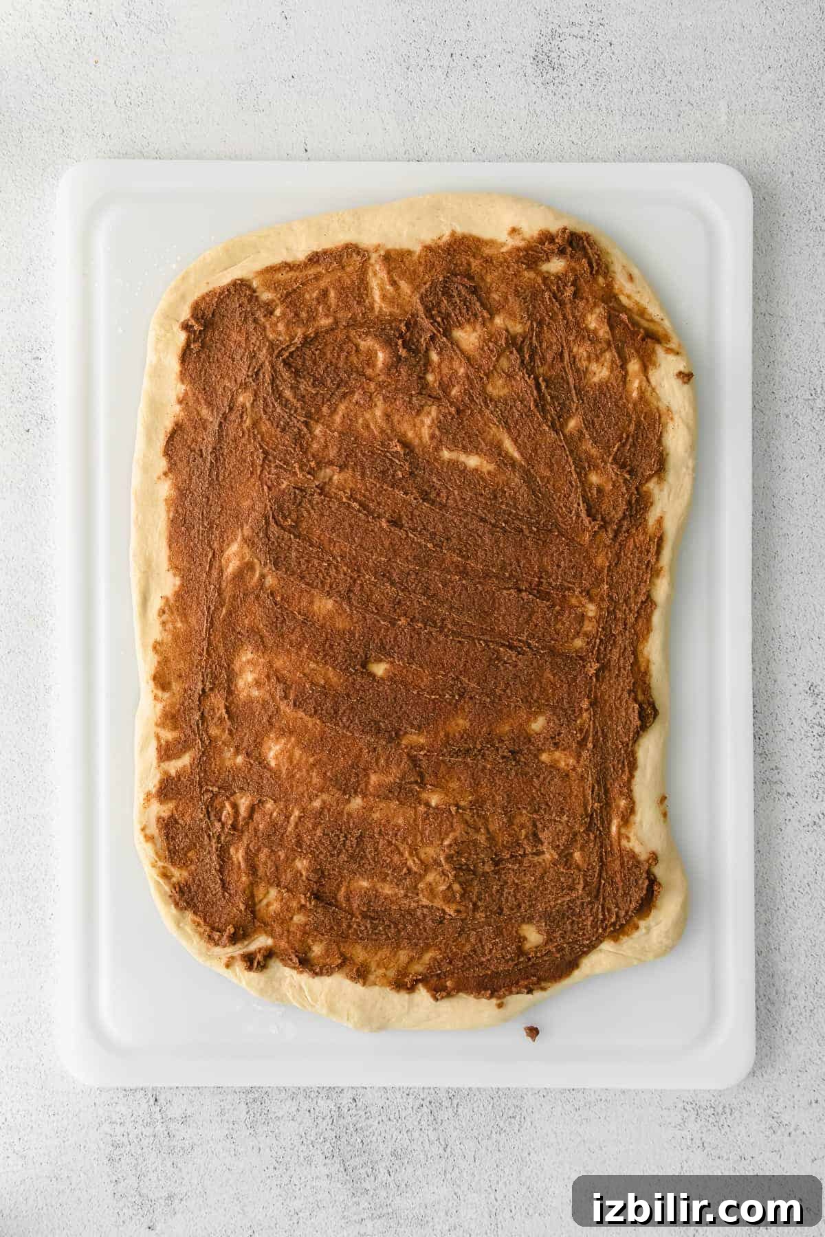 filling for maple cinnamon rolls spread on the dough