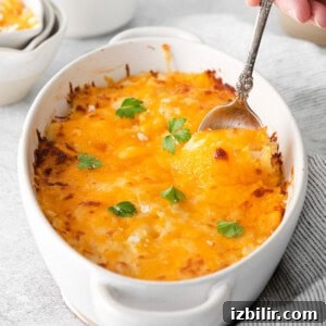 Creamy Cheddar Potato Casserole Recipe 2 finished cheesy potato casserole