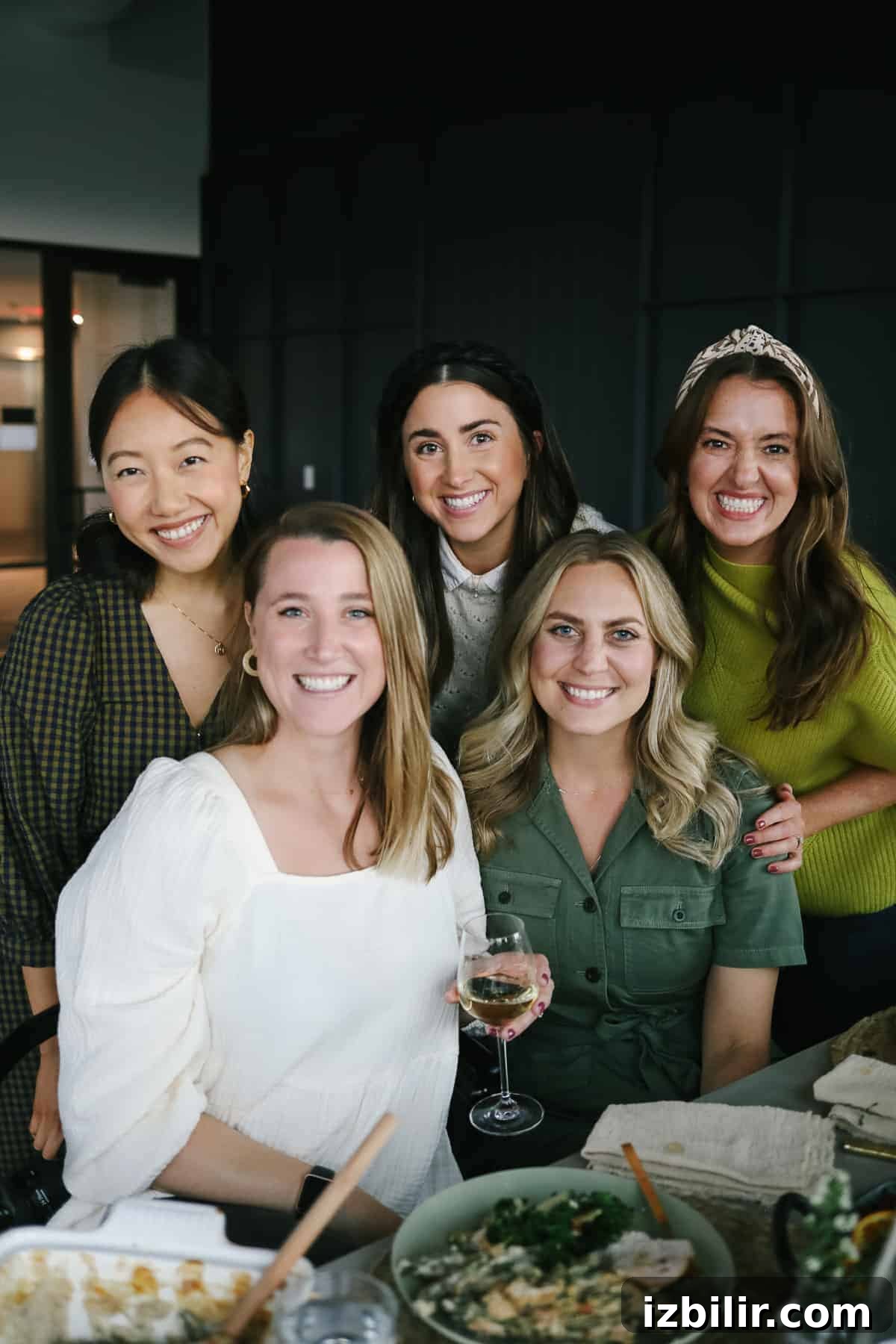 Thanksgiving Menu 2021: Your Complete Holiday Recipe Guide 3 5 women sitting at a thanksgiving table