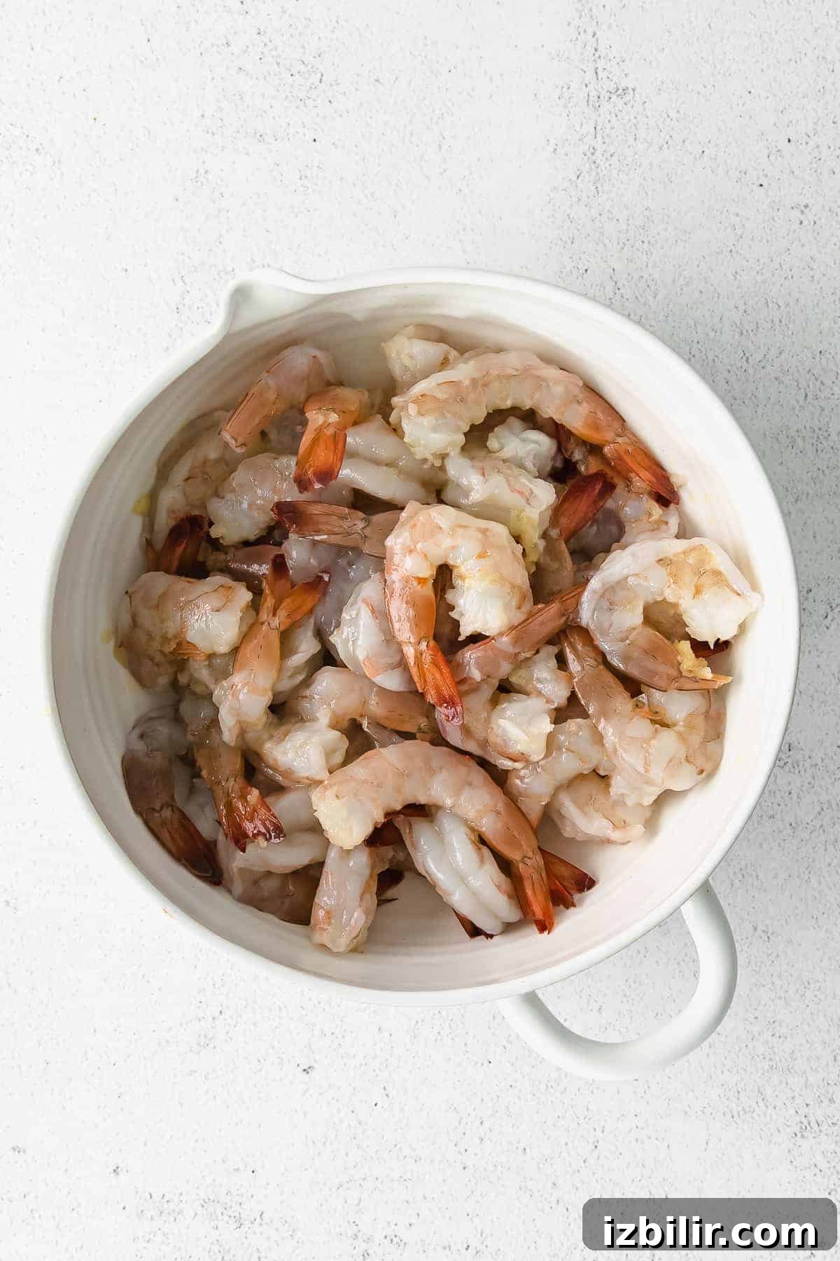 Garlic Butter Sauteed Shrimp with Lemon 4 Raw shrimp ready to be cooked.