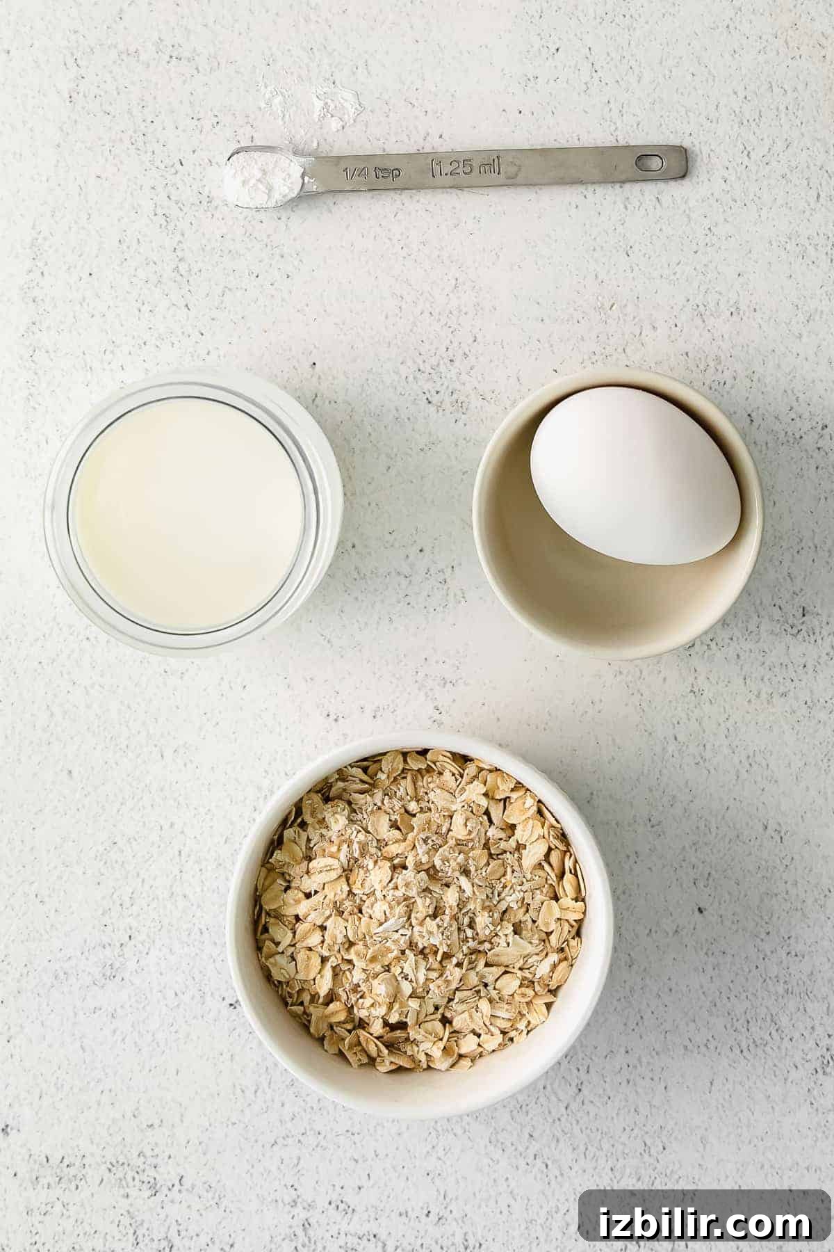 Ingredients ready to be mixed. blended baked oatmeal ingredients in bowls ready to be mixed together.
