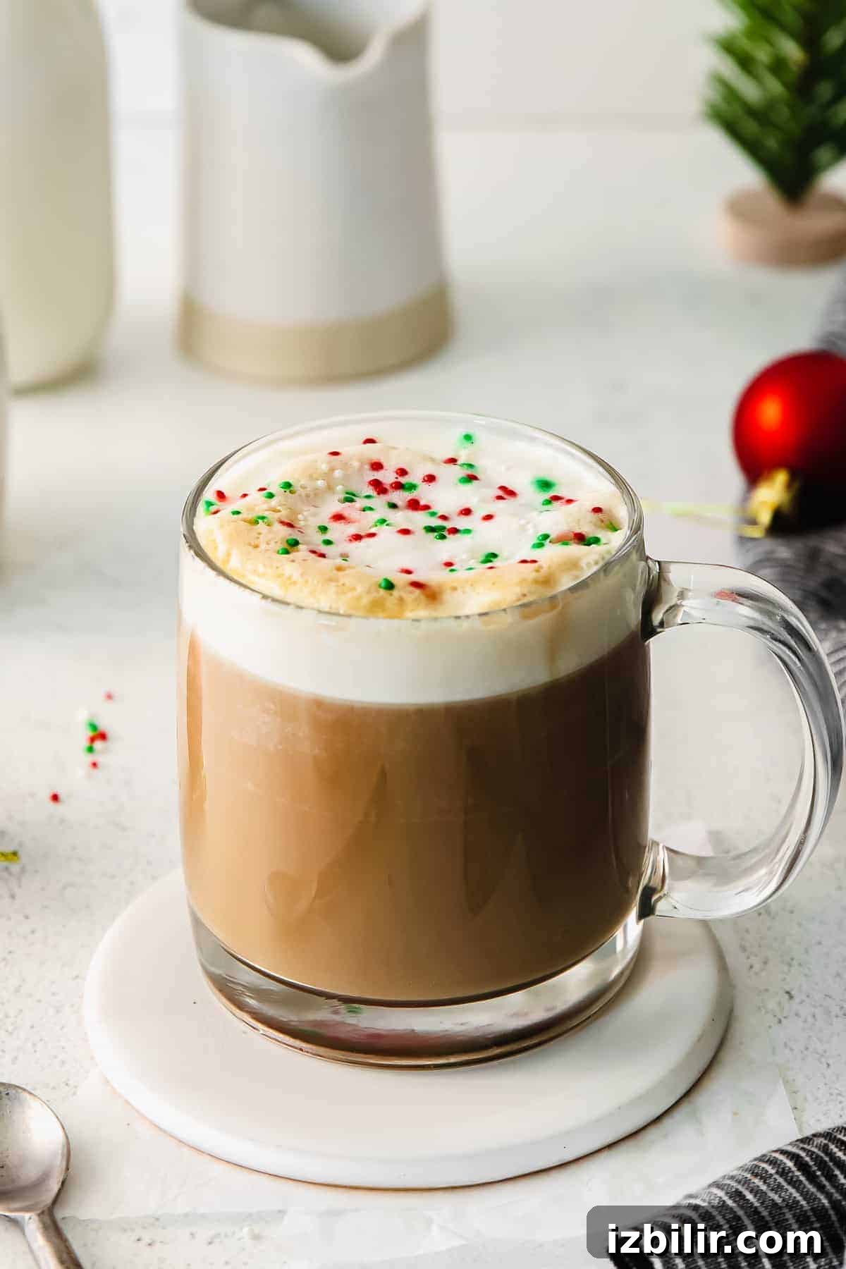 Our Copycat Starbucks Sugar Cookie Almond Milk Latte tastes like the one you get at Starbucks latte on counter