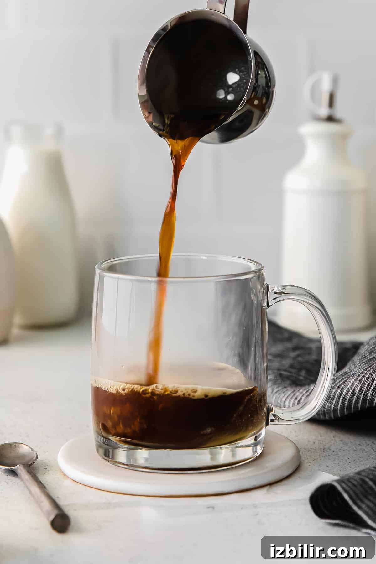 Pouring espresso pouring espresso into glass