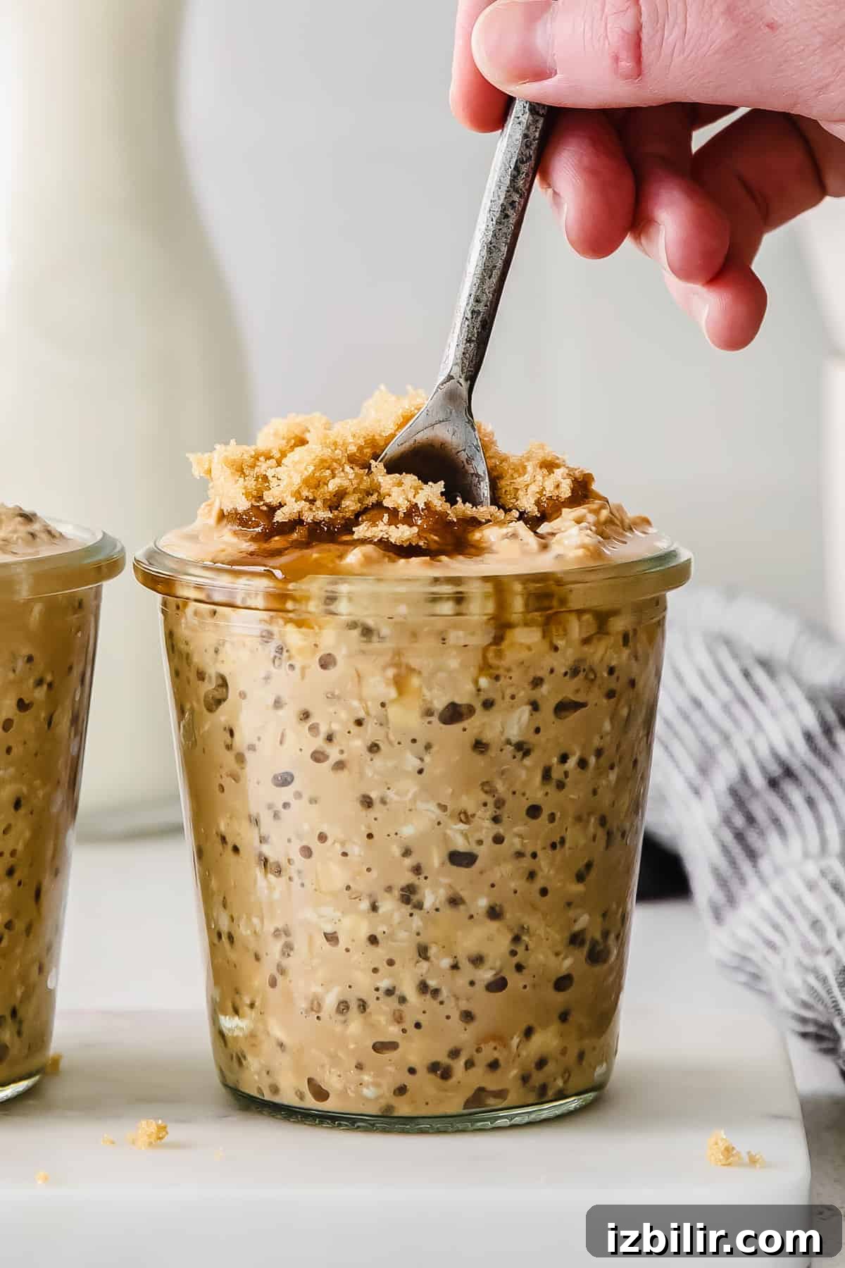 brown sugar shaken espresso overnight oats in a jar ready to eat as a grab-and-go breakfast