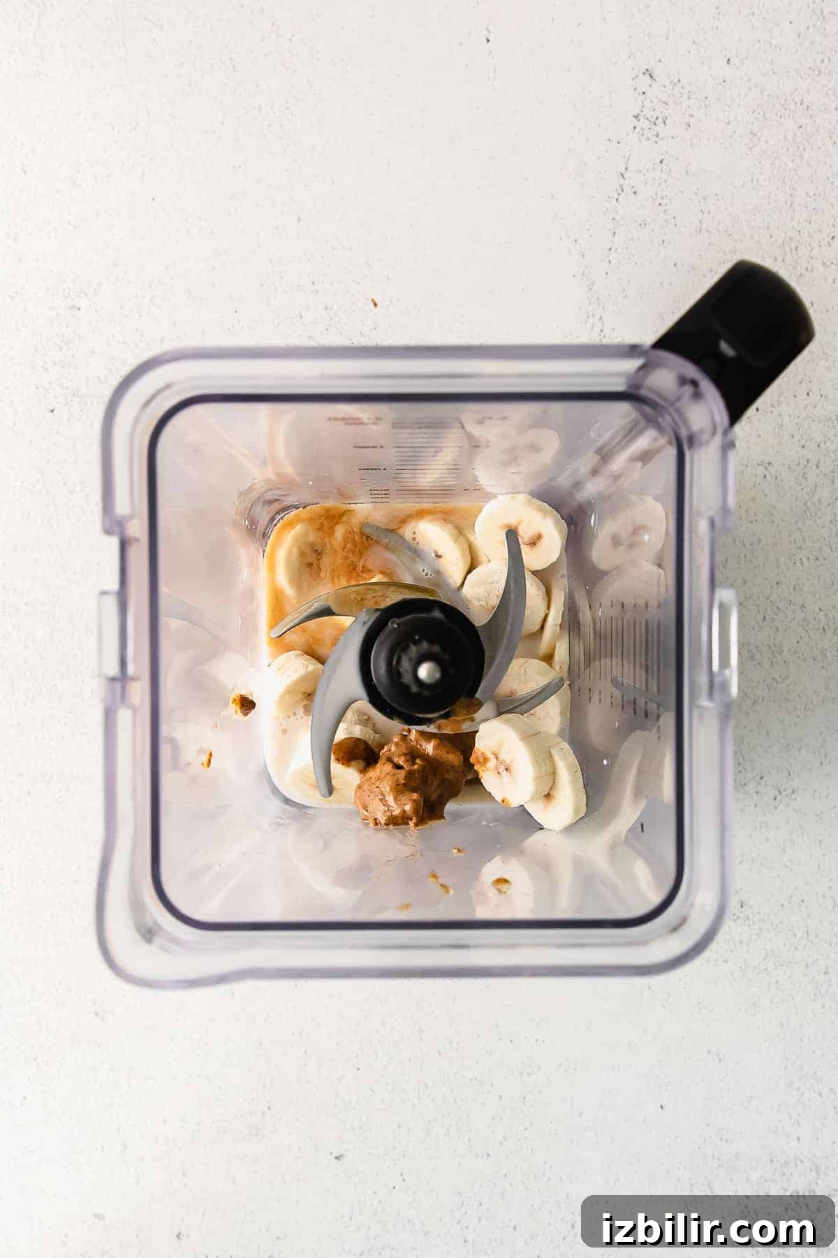All the ingredients for a cookie dough blizzard in a blender. 